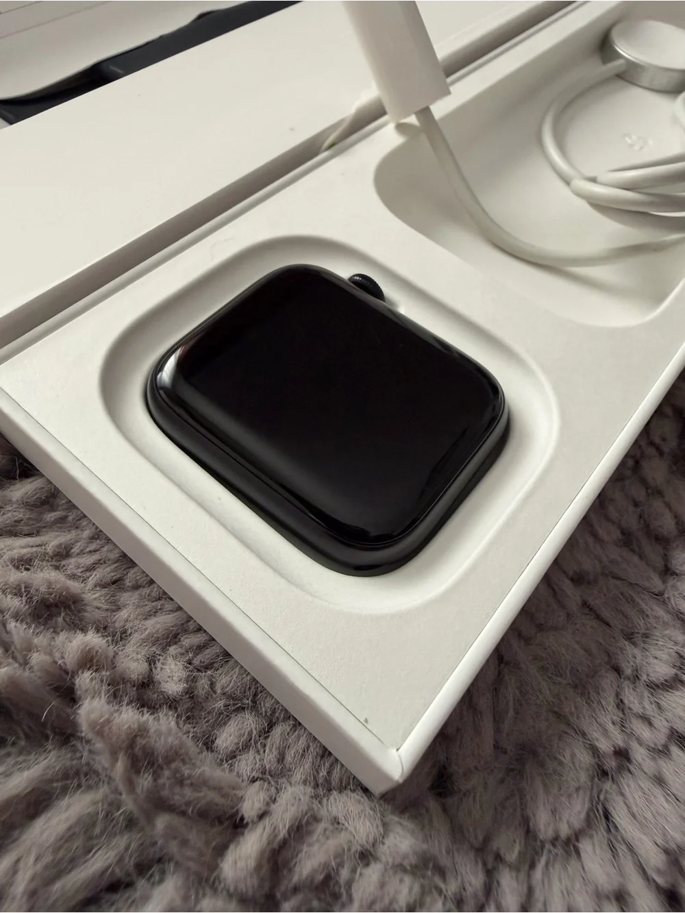 Apple Watch in Black with Black Sport Band